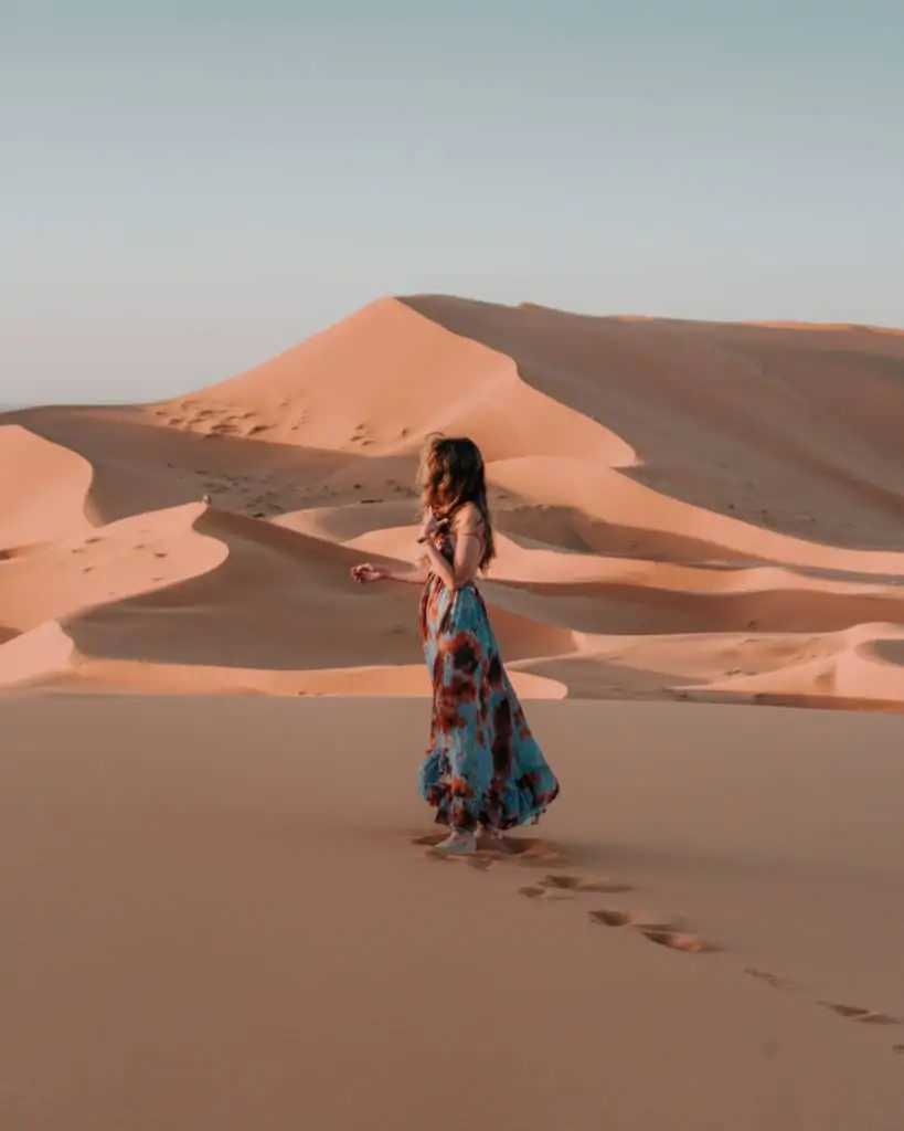Best Off-Season Destinations. sunset on the sand dunes in Sahara Morocco
