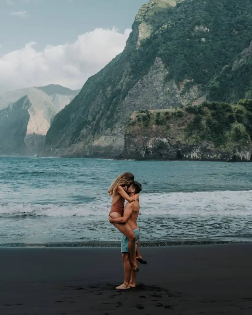 couple on a black beach in seixal what to see on madeira