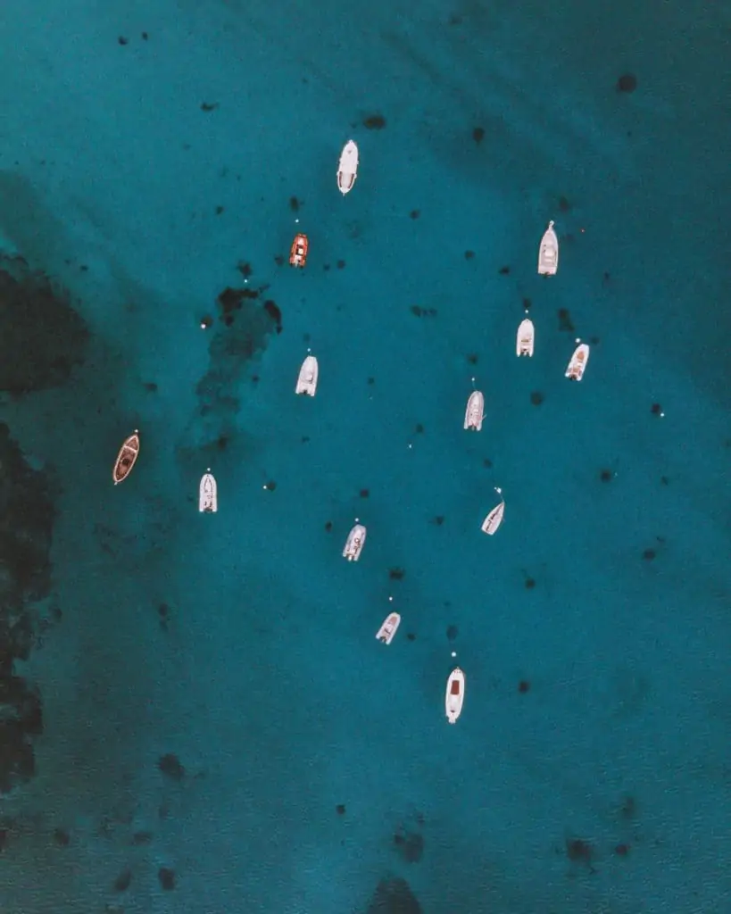 boats seen from a drone sardinia practical information